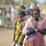 Photo of women waiting in line in S.Sudan