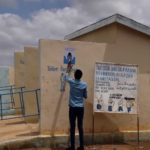 FCA community mobilizer distributes materials on the prevention of COVID19. Photo: Mohamed Ibrahim/FCA Somalia