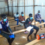 Grade 8 students participating in a class by radio in Kenya, supported by FCA. Photo: FCA
